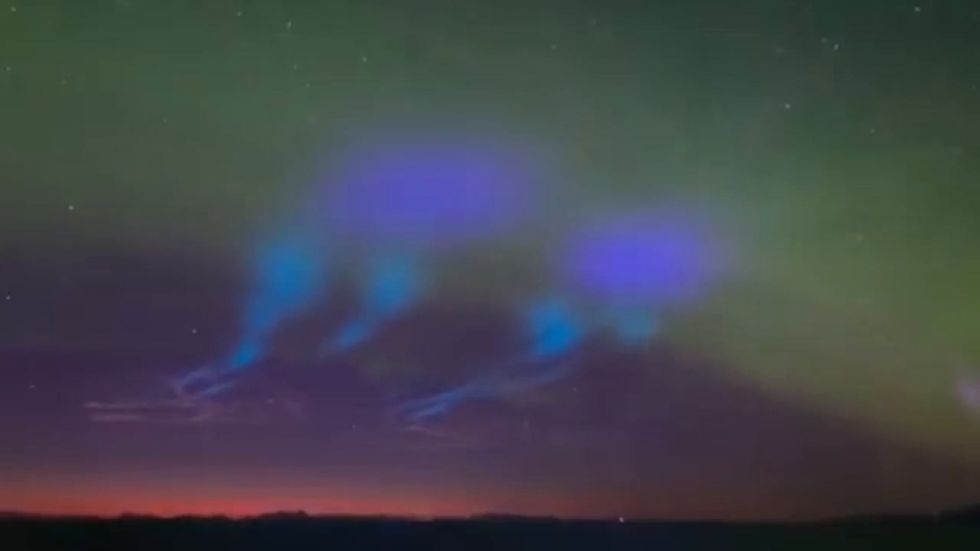Timelapse captures strange blue lights over Arctic Circle