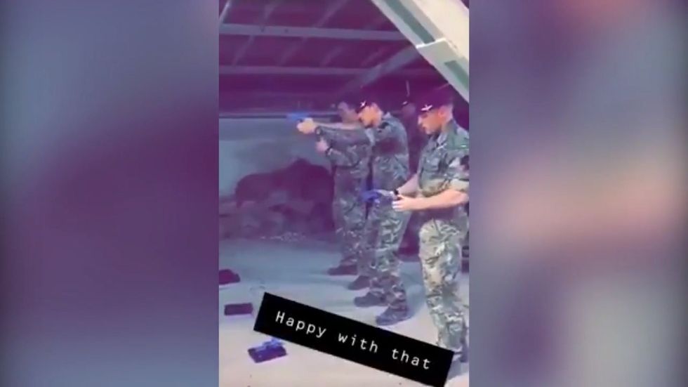 Video shows British soldiers using Jeremy Corbyn picture as target