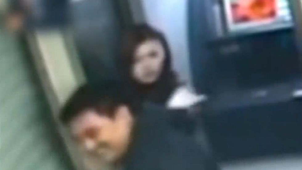 Robber with guilty conscience appears to immediately return money to woman at China ATM