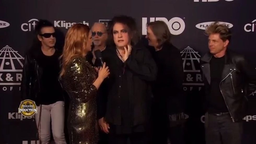 The Cure's Robert Smith gives deadpan response to red carper interviewer