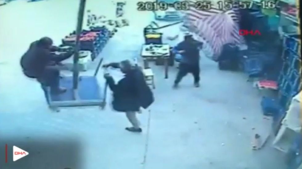 Moment Turkish man 'flies away' on umbrella during storm in town of Kadirli