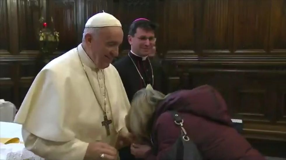 The Pope really doesn't seem keen on people kissing his Papal ring