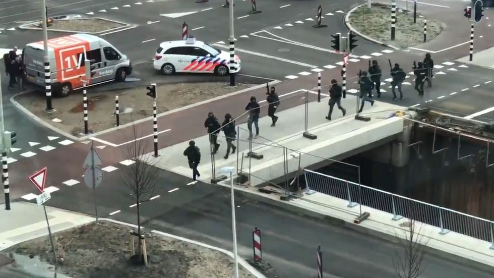 Utrecht shooting: Armed police hunt for gunman after attack on tram 