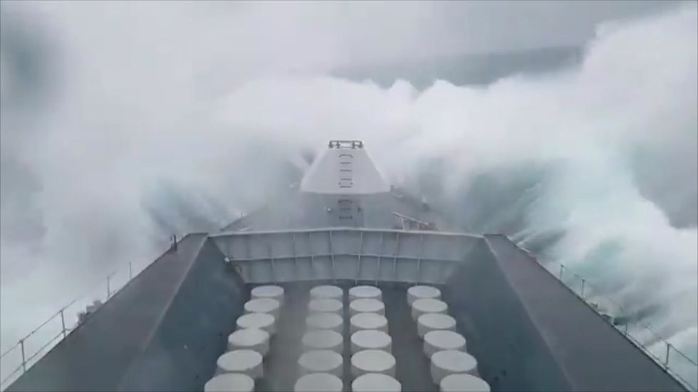 Royal Navy ship HMS Sutherland battles with huge Storm Gareth waves at sea