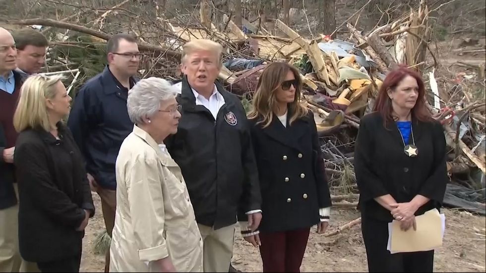 Donald and Melania Trump visit tornado-ravaged town in Alabama