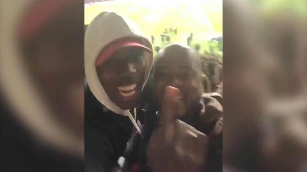 Paul Pogba celebrates Manchester United victory with Patrice Evra