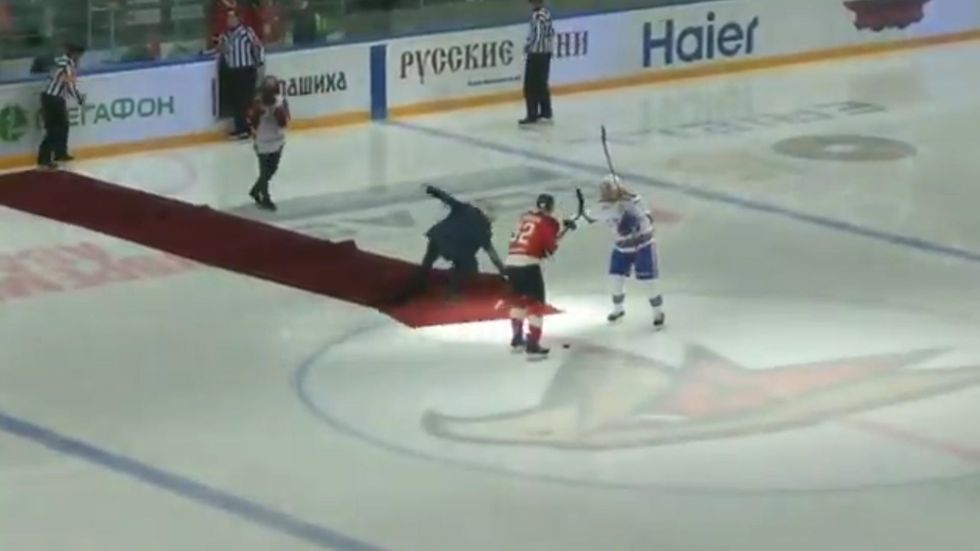 Jose Mourinho falls over after starting SKA - Avangard ice hockey match