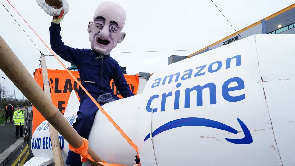 Black Friday protests: Jeff Bezos caricature rides rocket as Extinction Rebellion block 15 Amazon depots