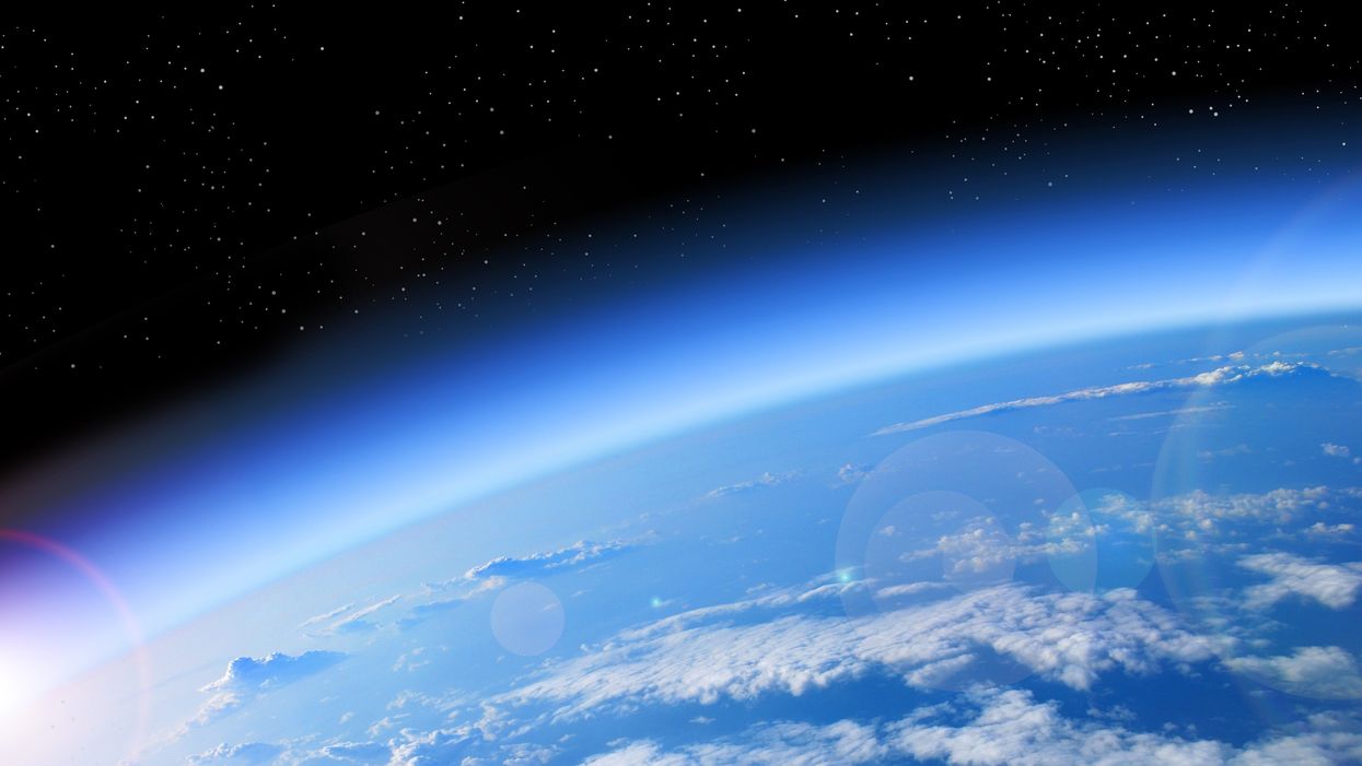 A sculpture of Earth that sank due to adverse weather is proving to be a very apt metaphor