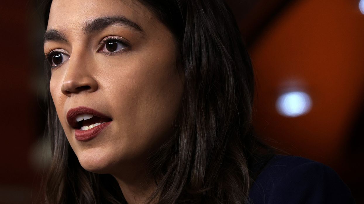 AOC calls out the hypocritical nature of Republicans’ gun-themed Christmas cards