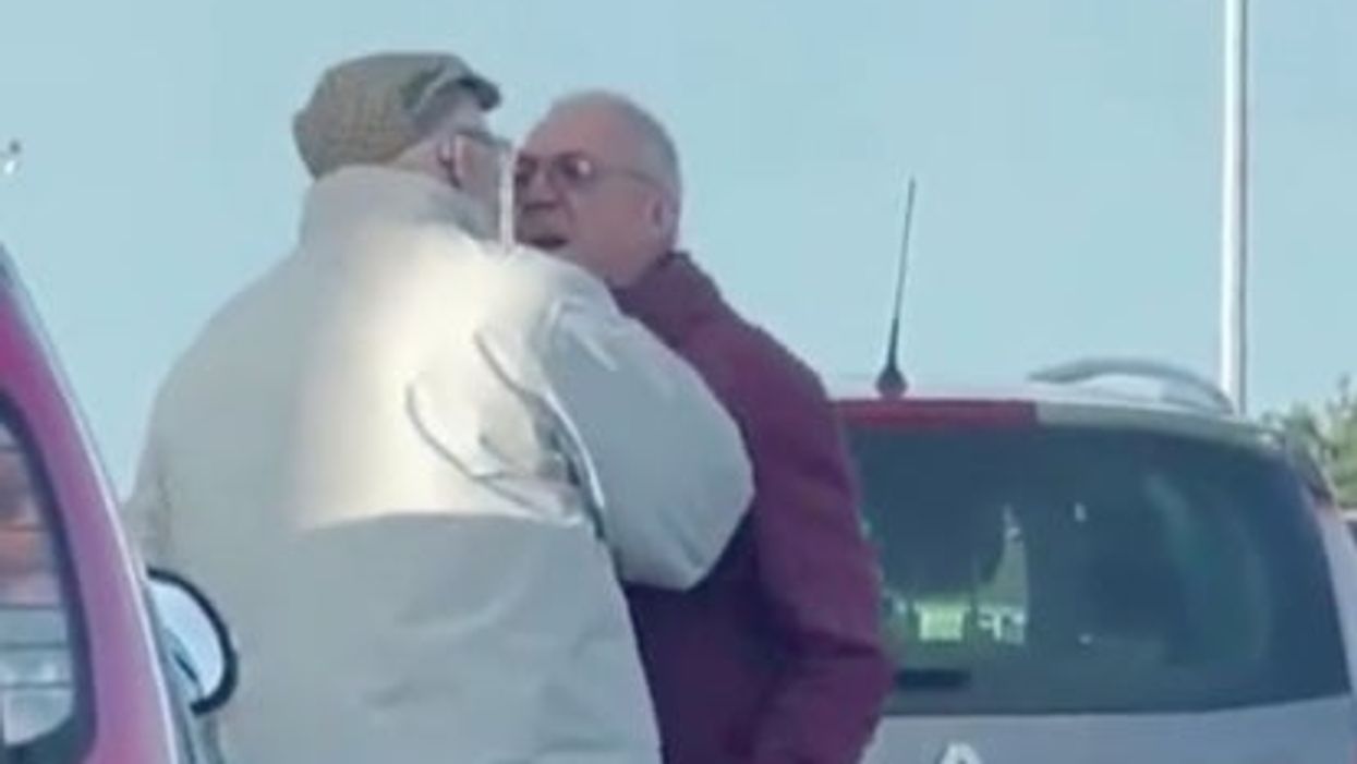 Shoppers break up pensioners brawling in supermarket car park