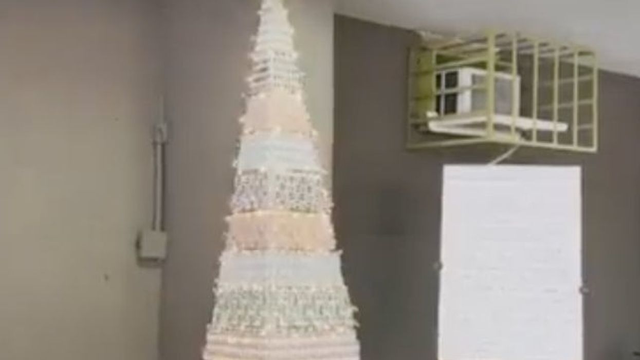 Christmas tree made from Covid and flu vaccine vials really sums up 2021