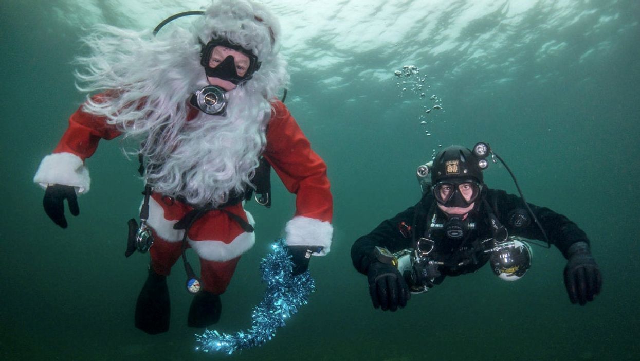 Diving centre submerges a Christmas tree playing festive tunes 19ft underwater