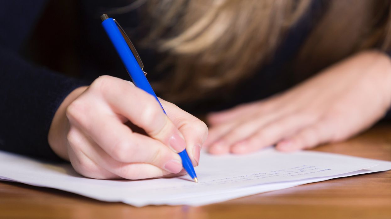 Parent takes correction pen to error filled letter from teachers union