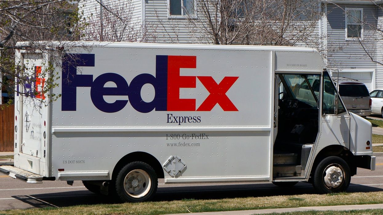 Viral TikTok shows FedEx driver throwing package at house from moving van