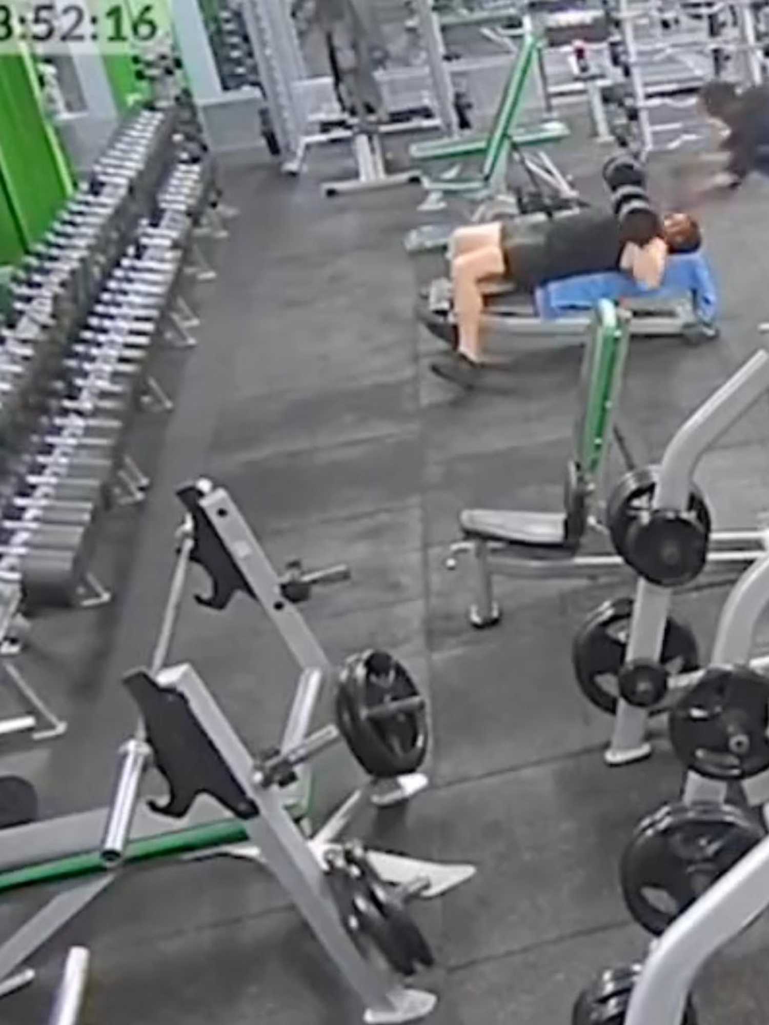 Horrifying moment man slams weight into gymgoer's head after pretending to fall over