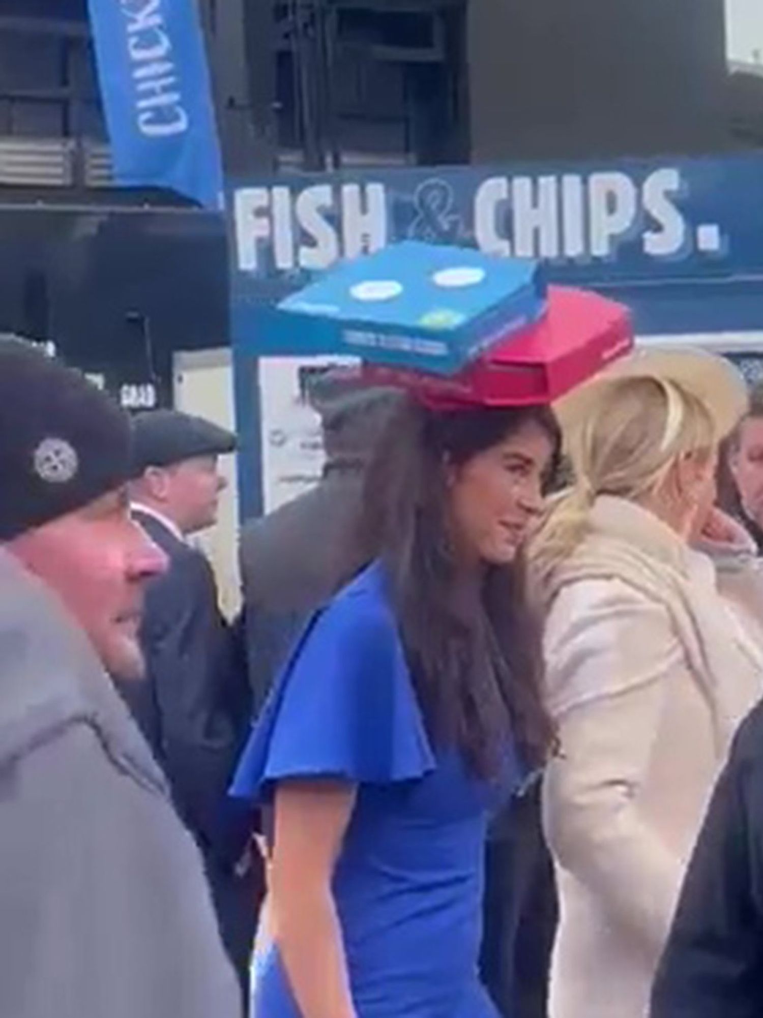 Cheltenham Ladies' Day guest wears Dominos themed fascinator complete with hidden pizza