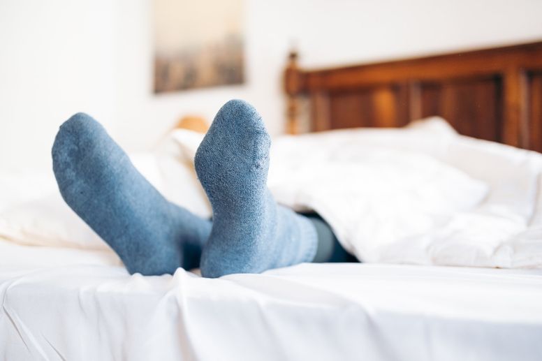 Scientists say wearing socks to bed is like 'sleeping in a toilet