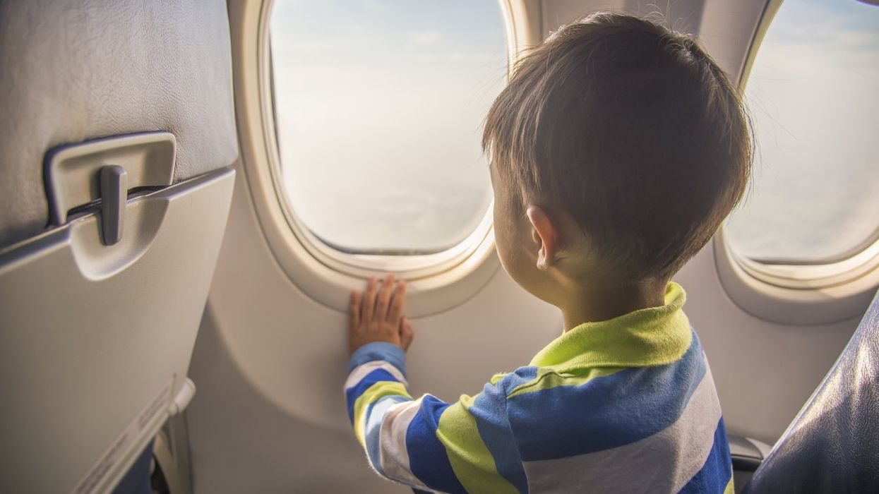 Woman's partner demands that her son sits by himself on 9-hour flight