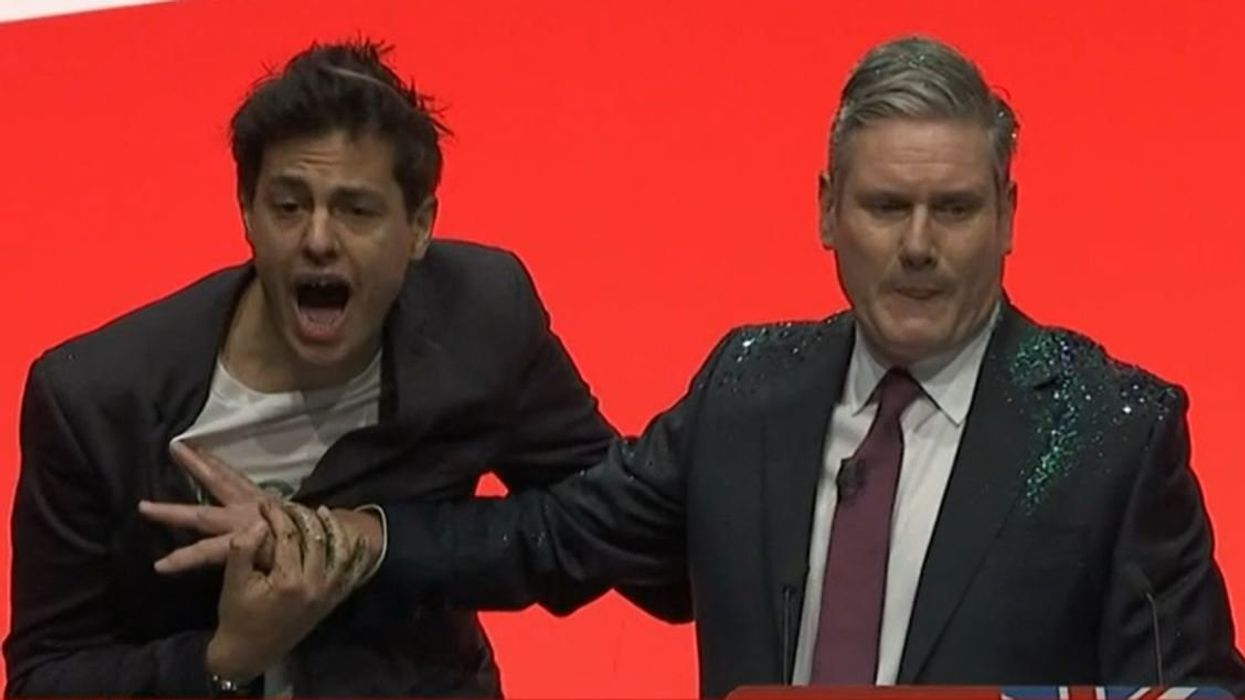 Keir Starmer conference speech: intruder storms stage and covers Labour leader in glitter