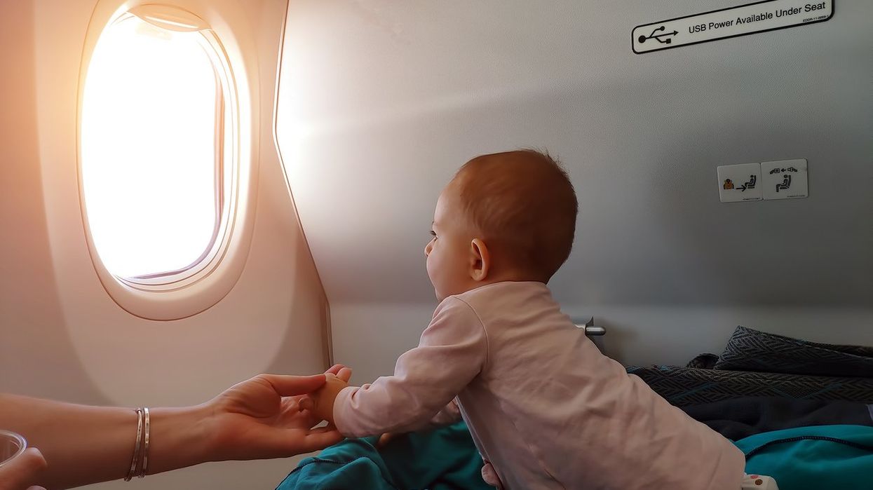 Woman appalled after passenger changes baby’s nappy right next to her on flight