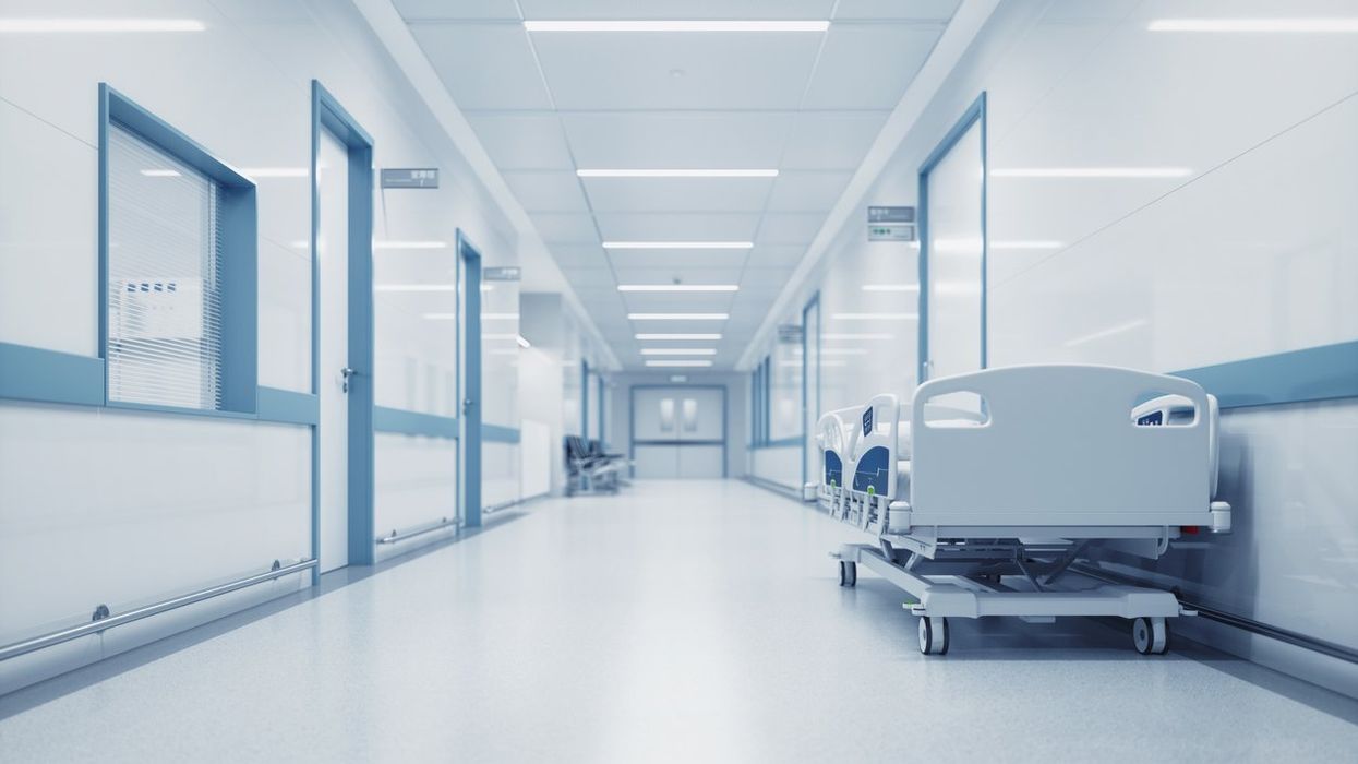 Woman found breathing in body bag hours after being declared dead