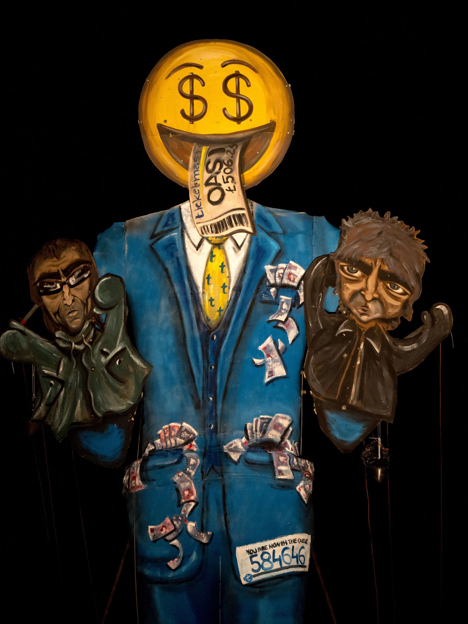 A giant effigy of Ticketmaster and Oasis was burned at a Bonfire Night event