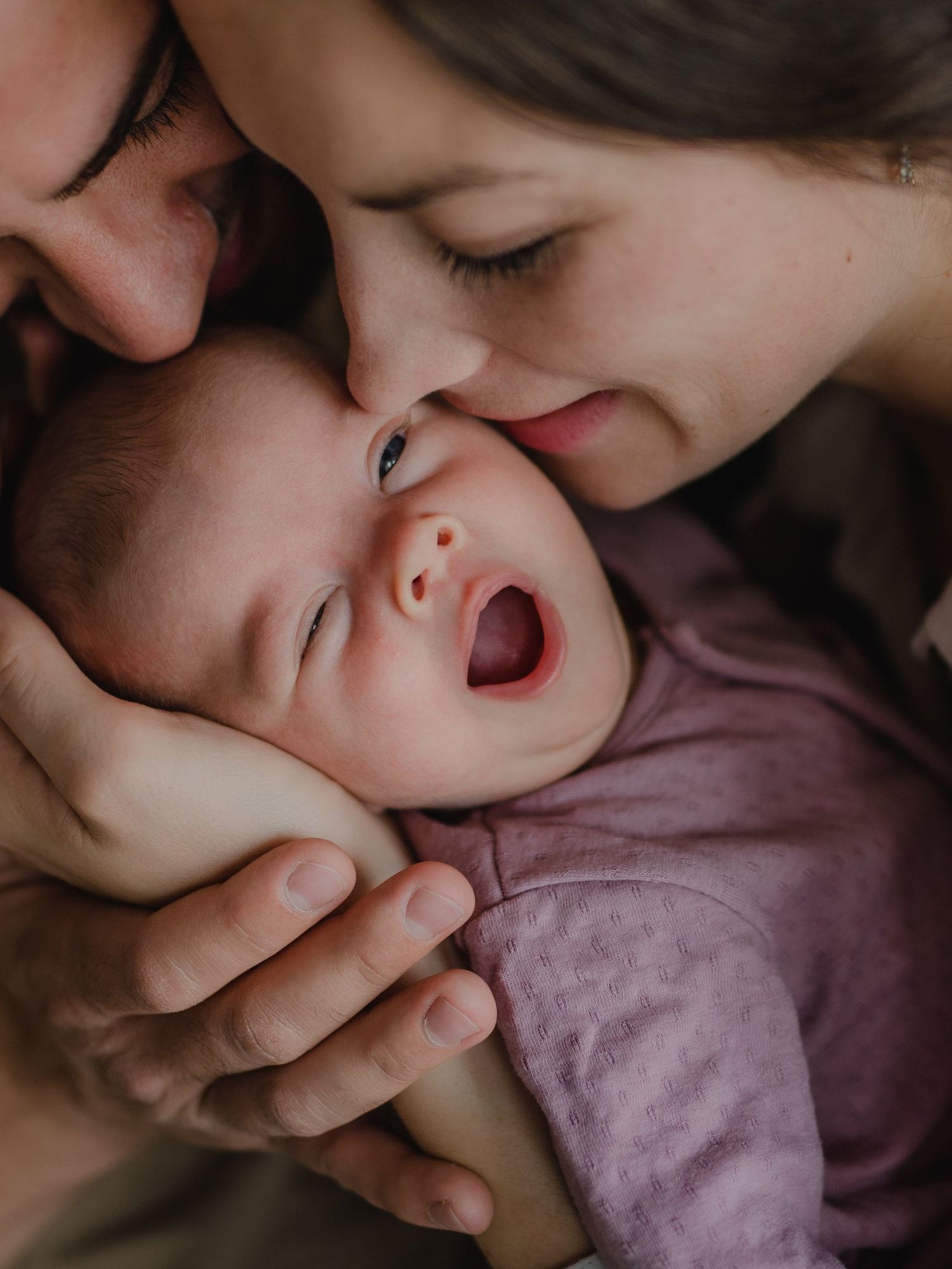 Surgeon warns against kissing and cuddling newborn babies due to unseen health risks