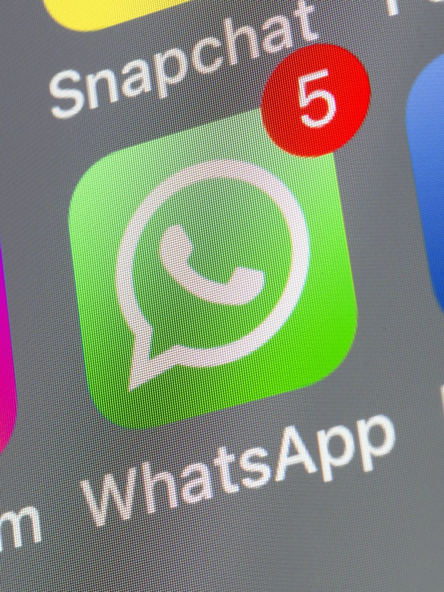 What is the Meta AI button on WhatsApp?