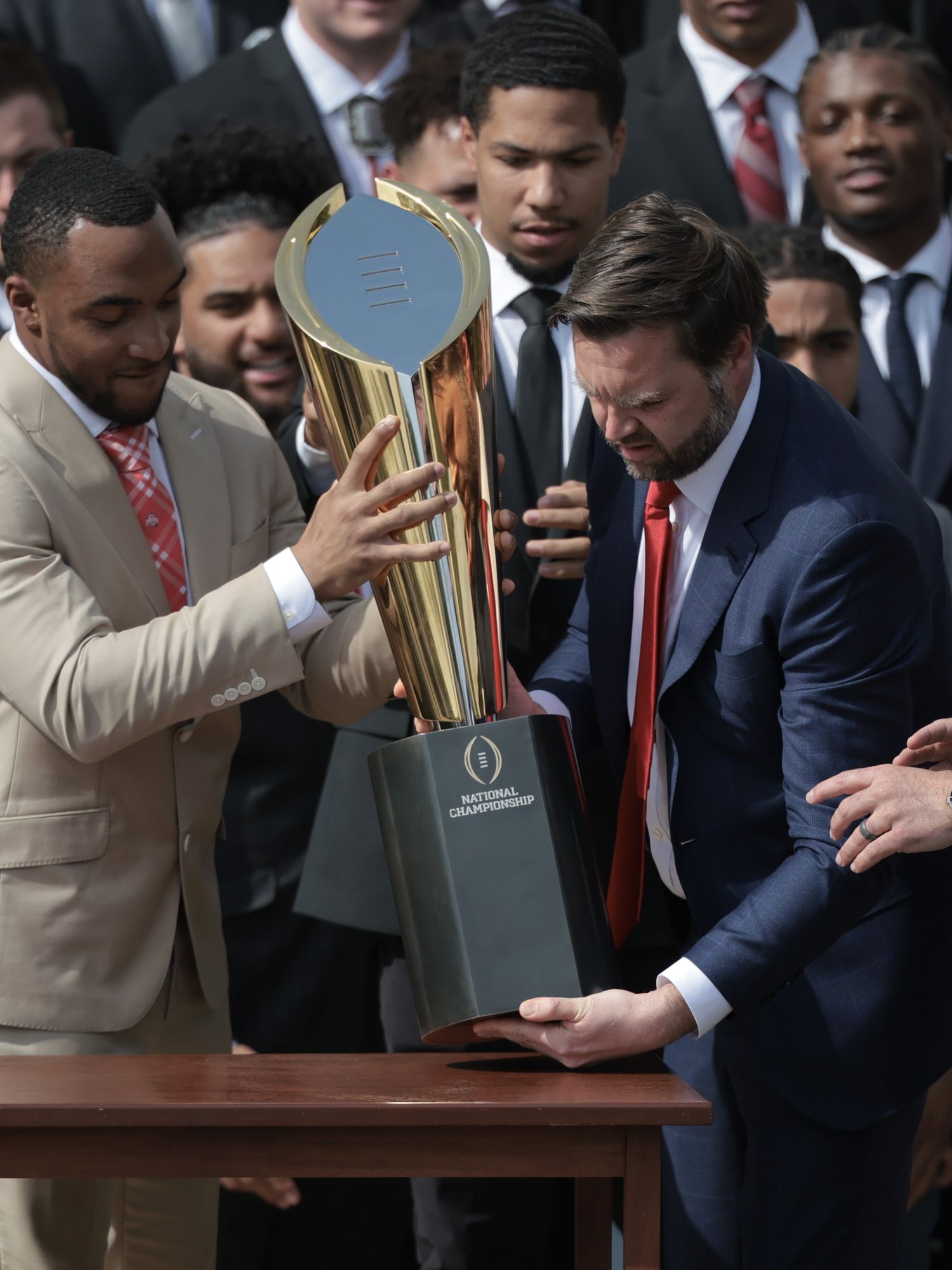JD Vance broke a college football trophy on live TV the moment he touched it