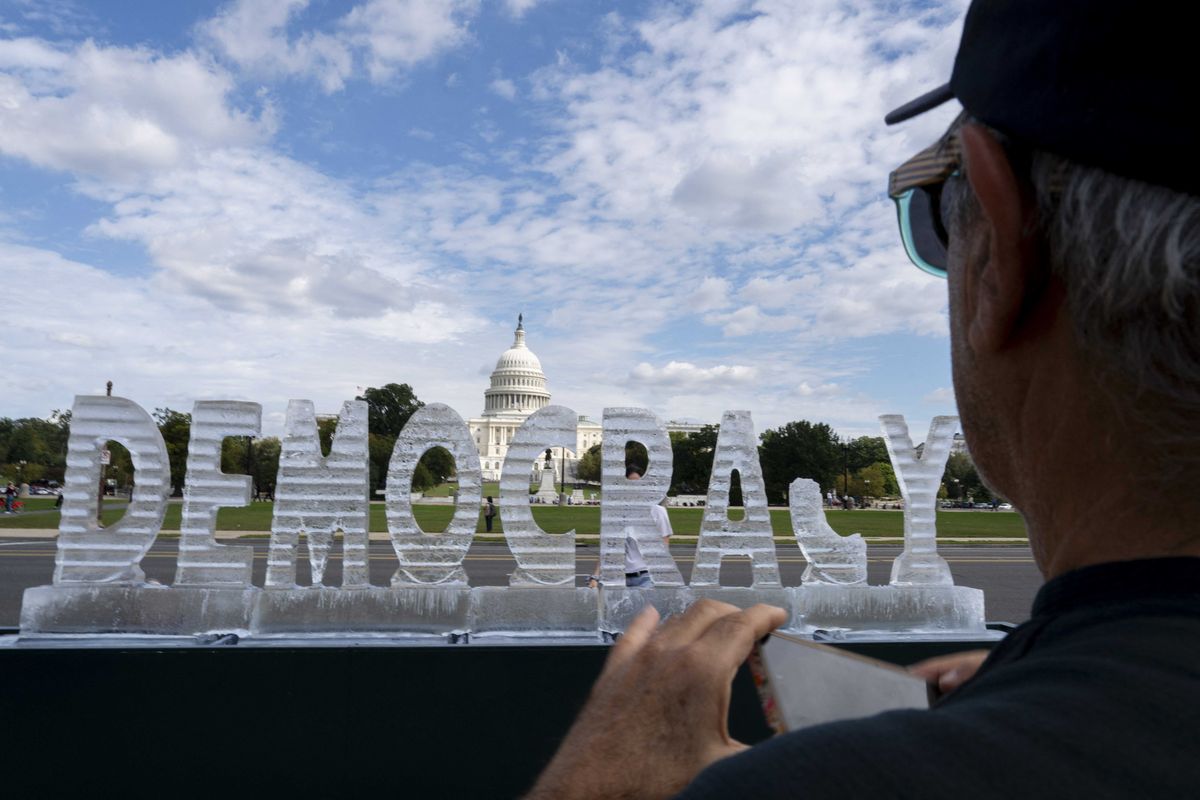Ice sculpture of 'Democracy' melts on Washington DC's National Mall