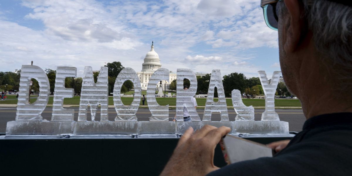 Ice sculpture of ‘Democracy’ melts on Washington DC’s National Mall Ice sculpture of ‘Democracy’ melts on Washington DC’s National Mall