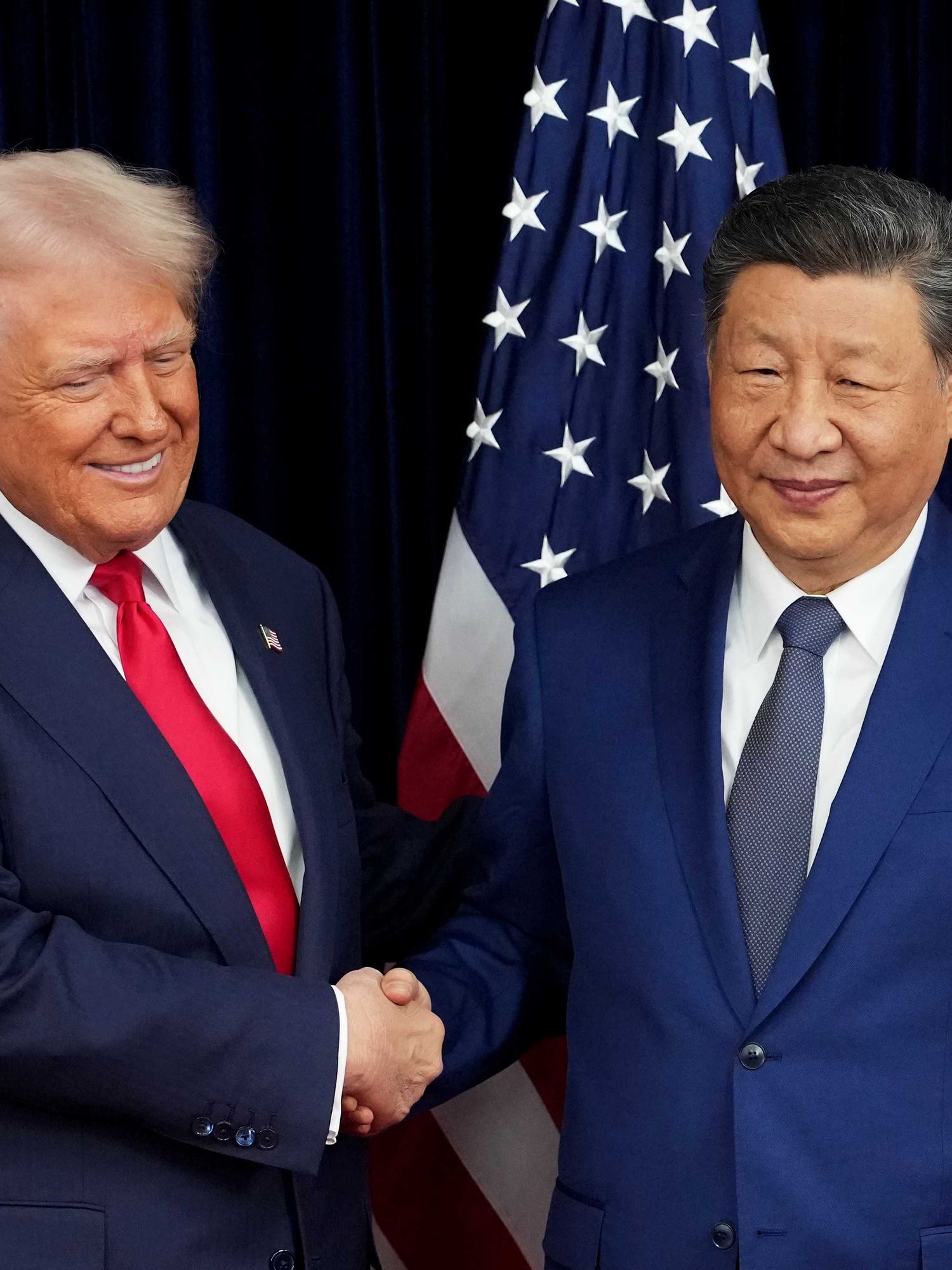 President of China Xi Jinping couldn't look more unimpressed with Donald Trump during 'cold' exchange