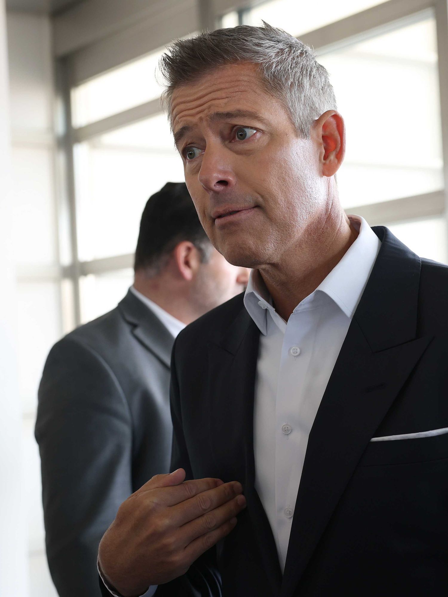 Transport secretary sparks debate by telling flyers to 'dress a little better' when travelling