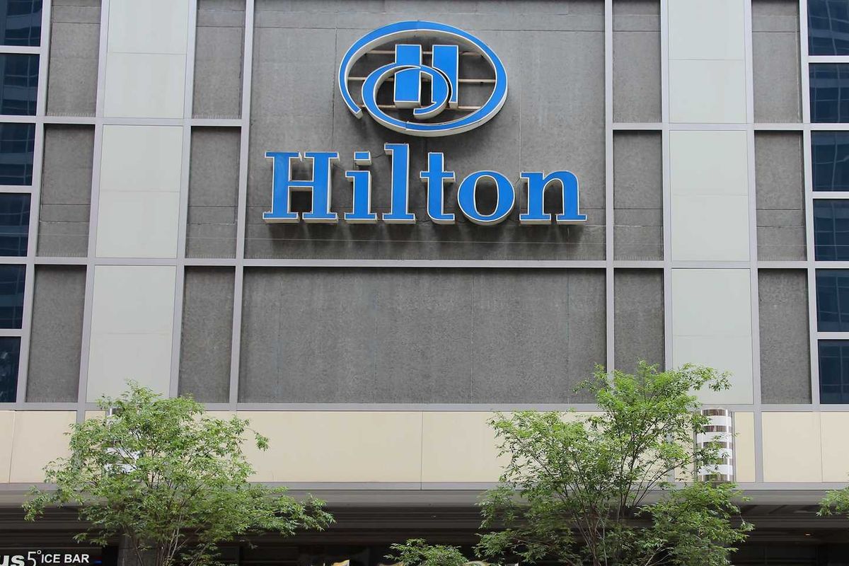 Why is the US government feuding with Hilton Hotels over ICE?