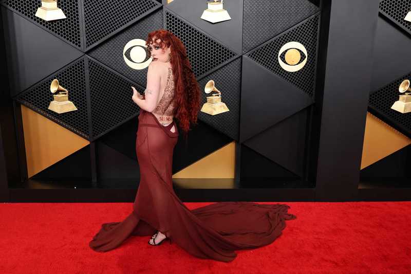 sheer dress grammys Tyla kept things elegant and understated in this DSquared2 gown at the Grammys. The soft nude-toned with a sheer finish skims the body and sparkles lightly under the lights, a nod to soft Chappell Roan laughs off Grammys