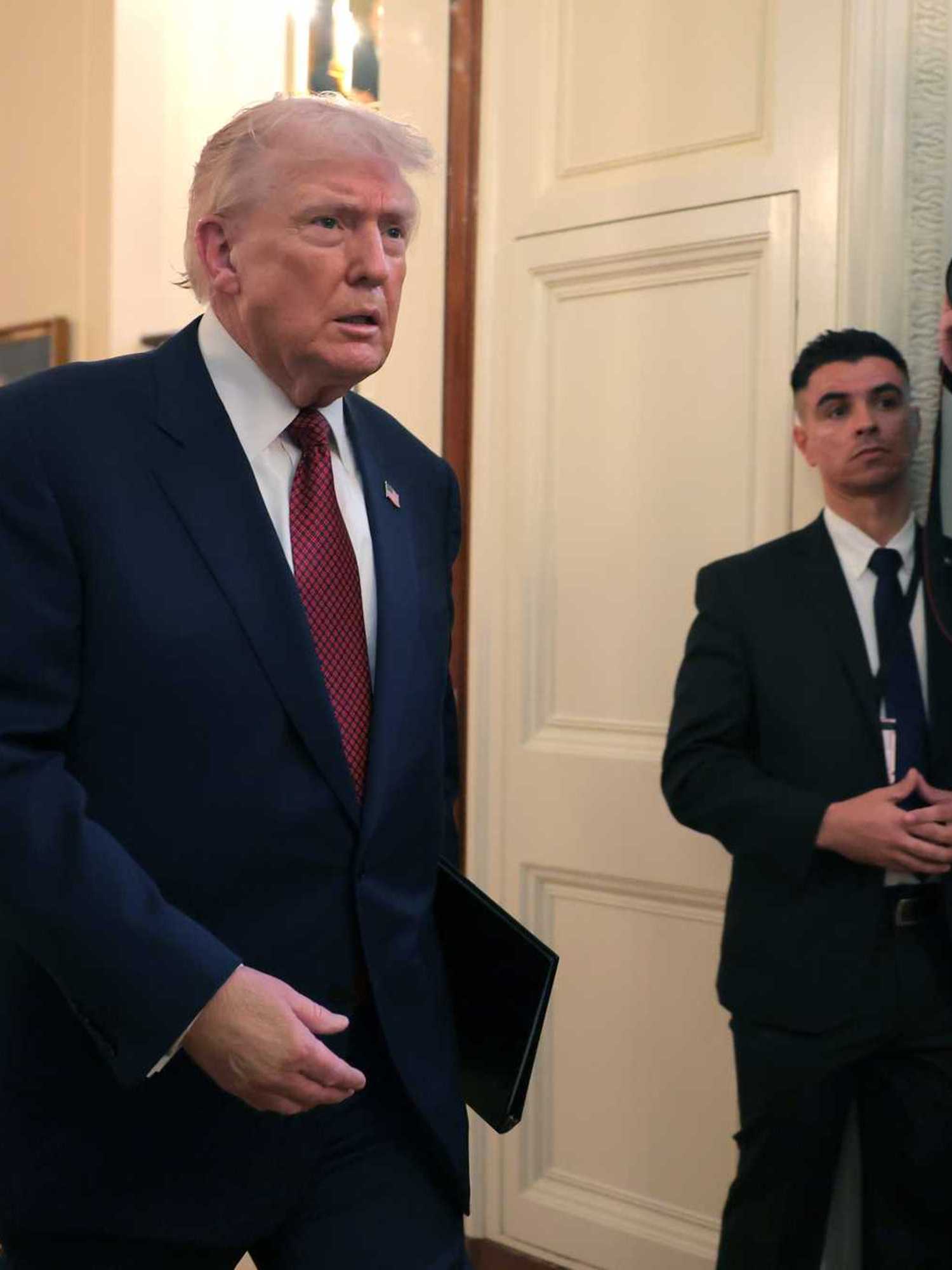 Trump’s bruised hand becomes talking point once more - this time for the cover-up
