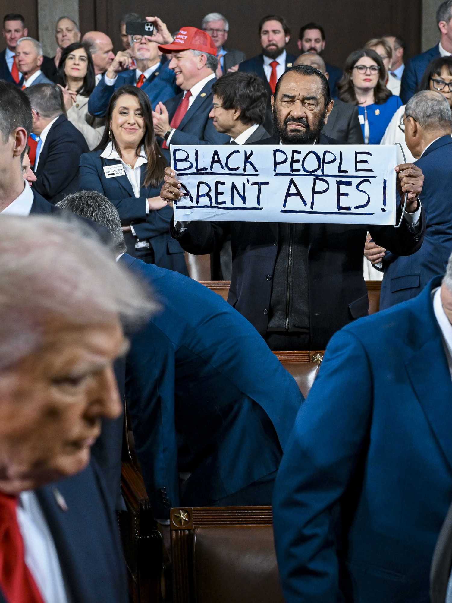 Rep. Al Green removed from Trump’s State of the Union address for 'Black people aren't apes' protest sign