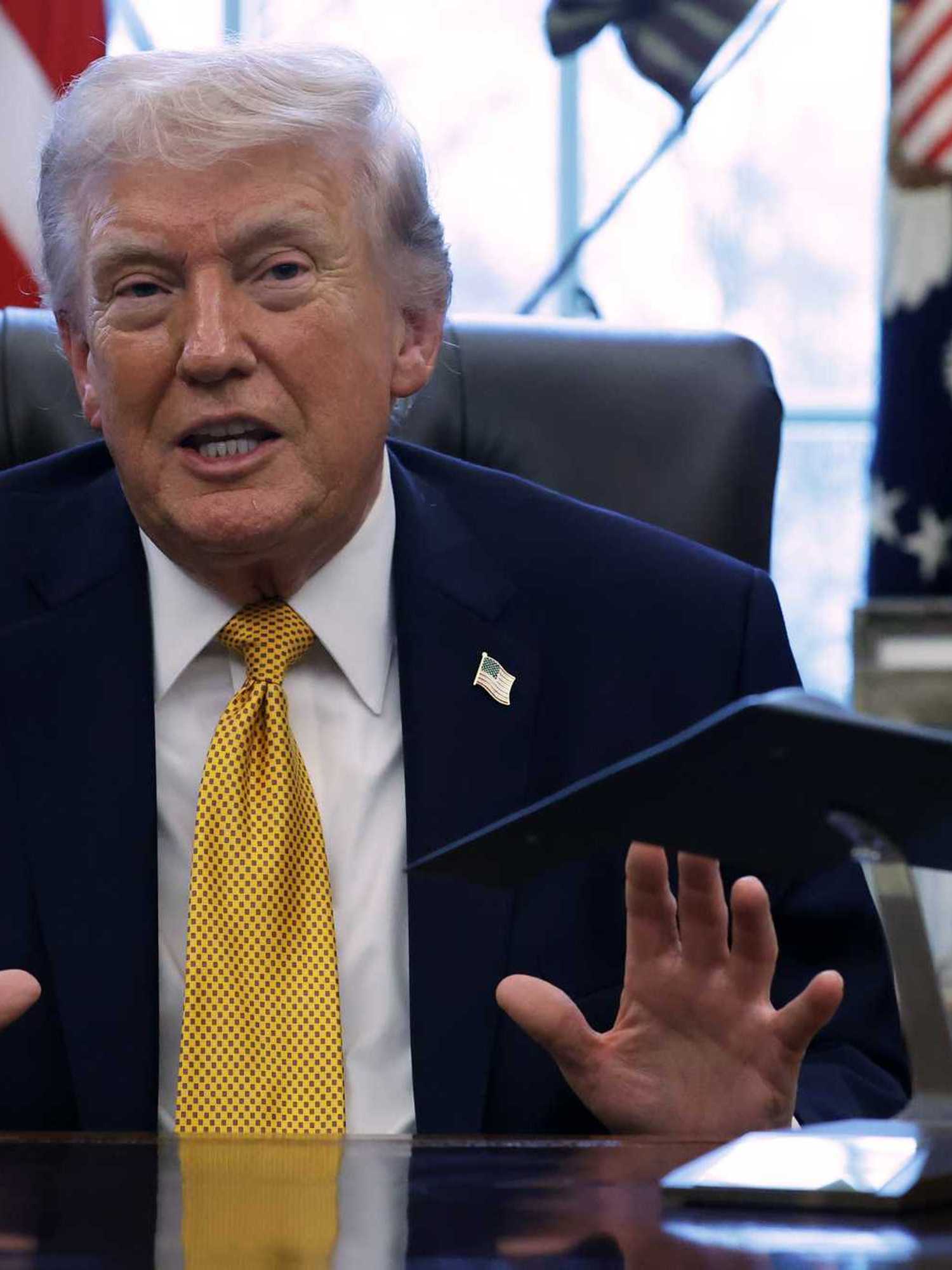 Which country is Donald Trump threatening to 'take' for the US next?