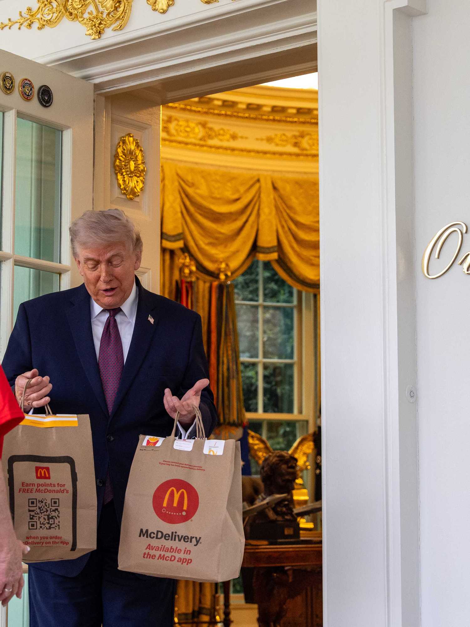Trump uses DoorDash driver in bizarre Oval Office McDonald's tax stunt