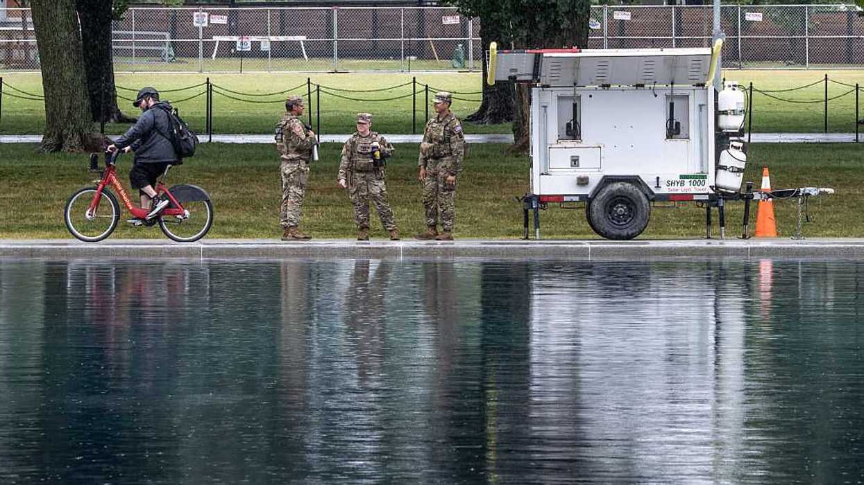 'Trump can't admit he screwed up': Reaction as fencing goes up around Reflecting Pool