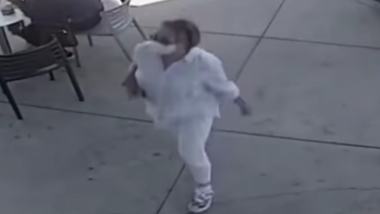 White woman loses her job after being filmed deliberately coughing on a baby in 'racially motivated' incident