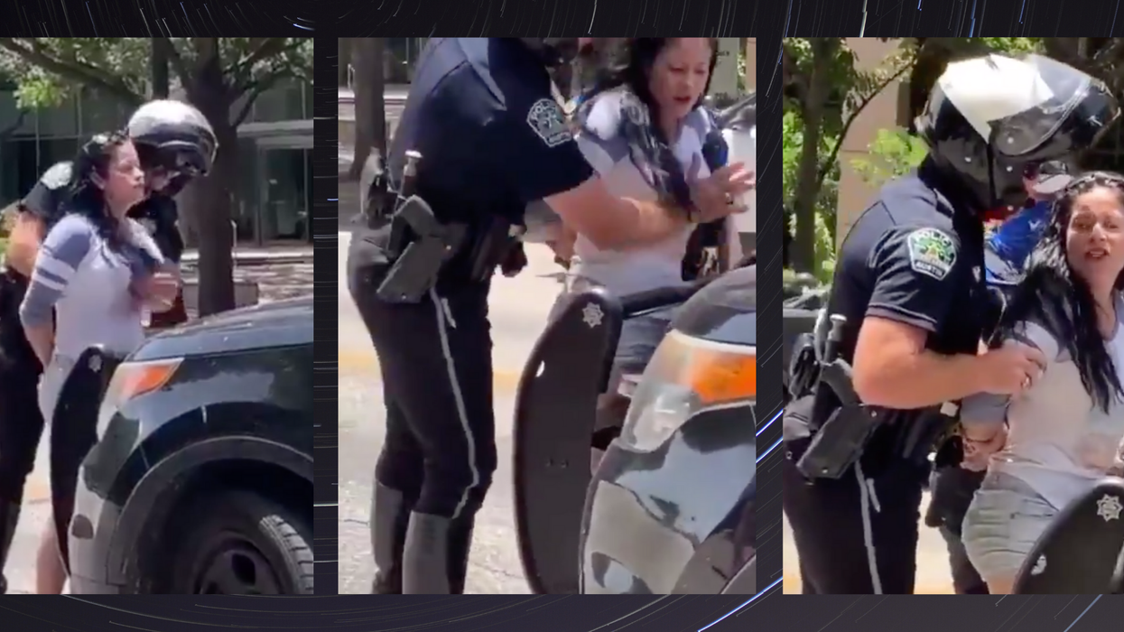 Outrage as video emerges of male police officer 'groping' distressed woman's breasts during arrest