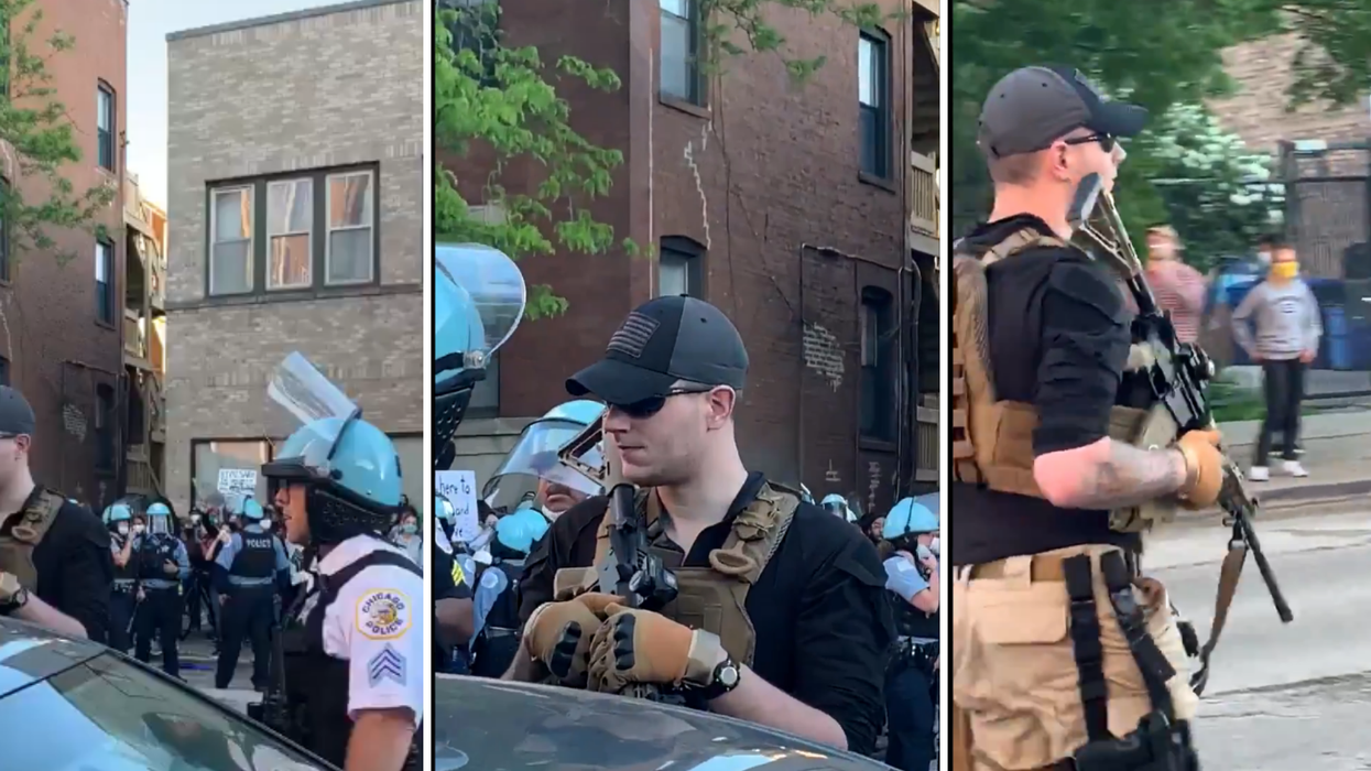 This white man showed up to a protest with a huge rifle and military gear – police just let him walk away