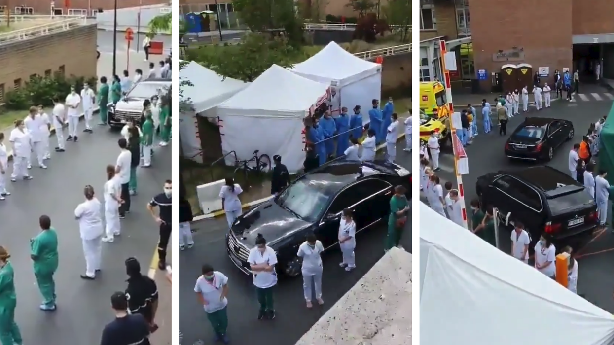 Belgian healthcare workers turn their backs on prime minister in powerful silent protest