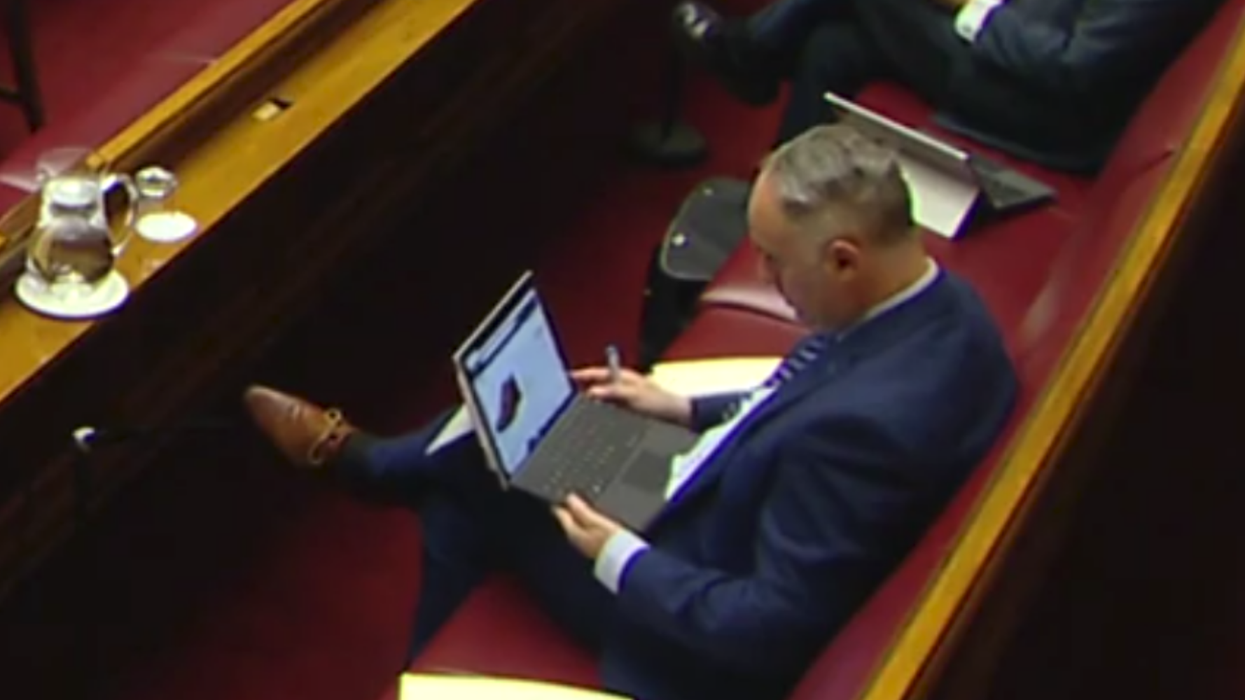 DUP politician sends BBC picture of his worn shoes after being caught shopping during crisis meeting