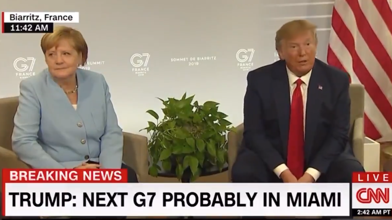 Trump said he had 'German in my blood' and Angela Merkel didn't even bother trying not to snort in his face