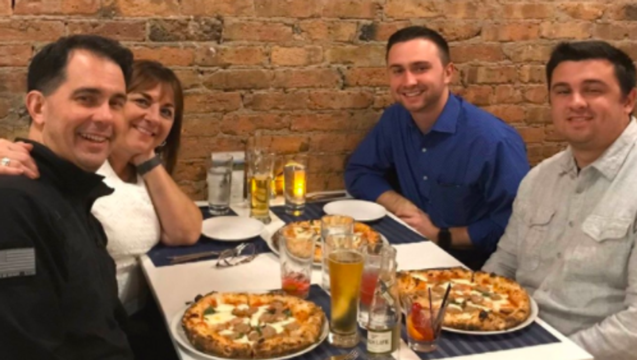 Former Wisconsin governor bizarrely crops picture of a pizza from 2019 to show support of local business