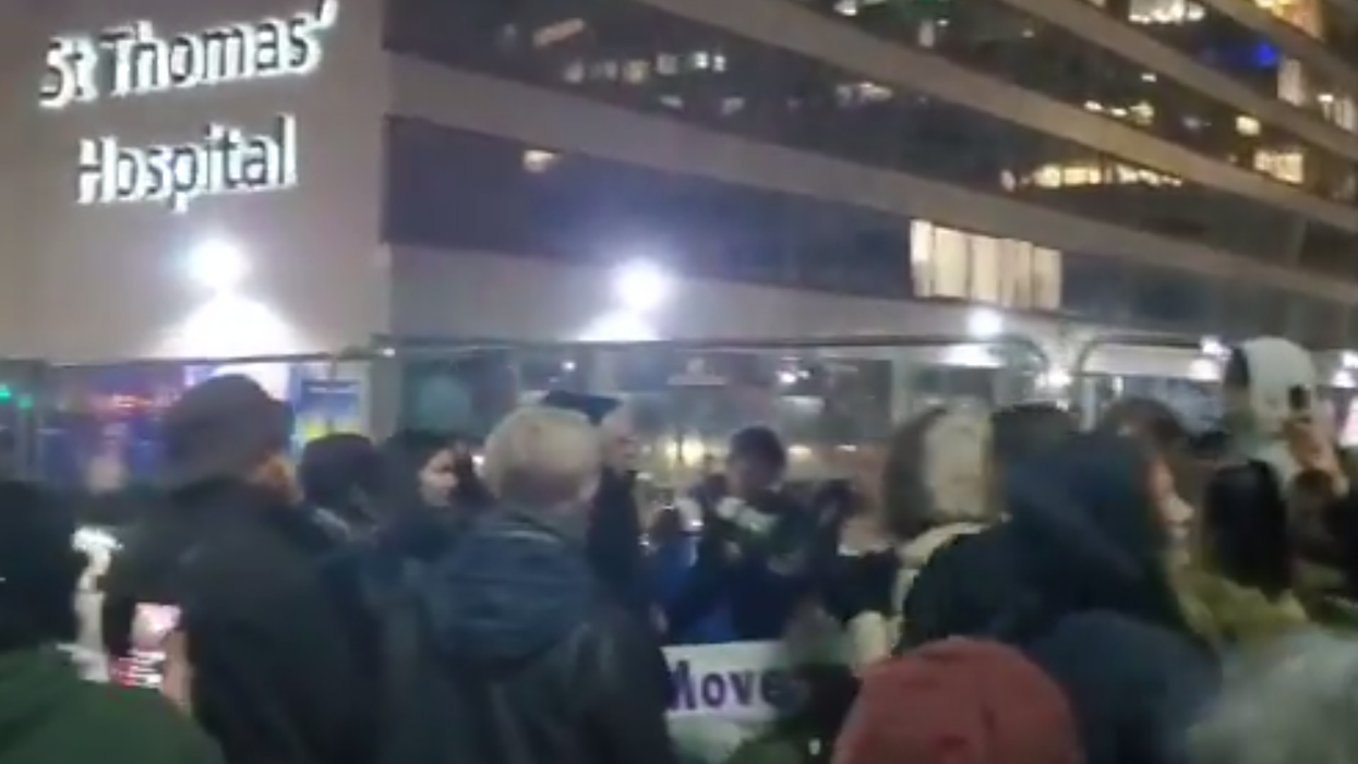 Outrage as maskless crowd chant ‘Covid is a hoax!’ outside busy London hospital