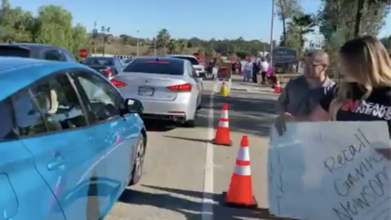 Shocking footage shows anti-vaxxers intimidating people waiting to get Covid vaccine